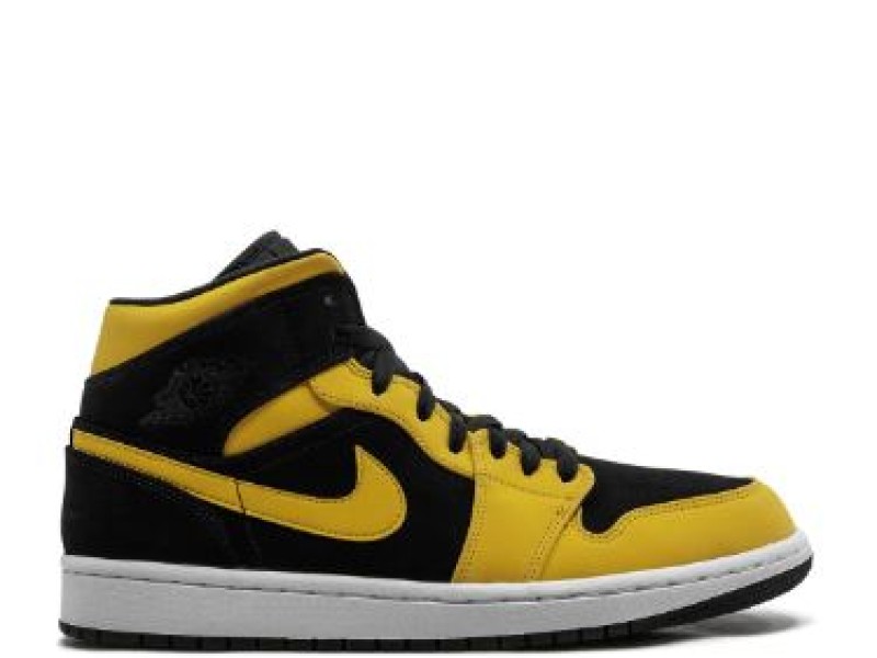 Nike Air Jordan 1 Mid amarillas con blanco y logo negro.